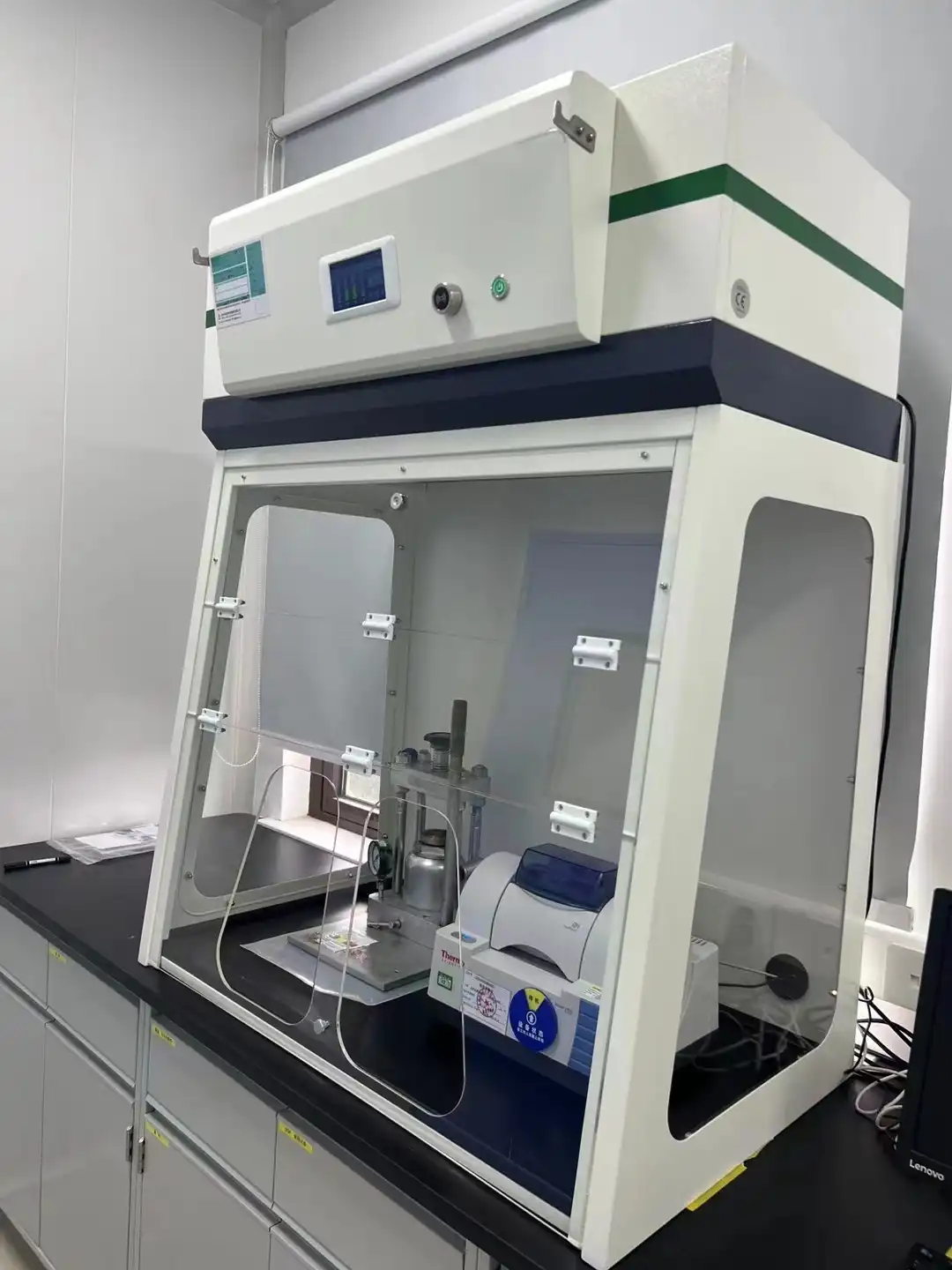 What are the advantages of using a portable ductless fume hood?